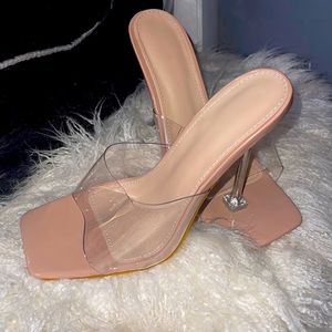 Nude/clear - pyramid heel square toe shoe.